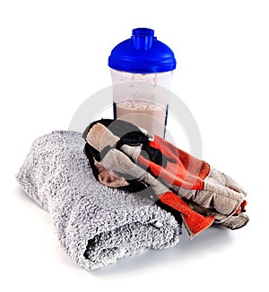 Gym equipment: towel, gloves, postworkout drink