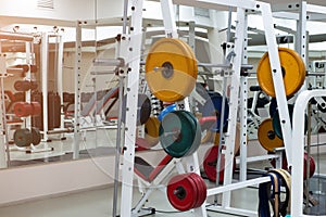 gym modern fitness center room. empty hall with simulators on different muscles.