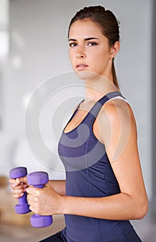 Gym, portrait and woman with dumbbells for workout, training and fitness indoor at home, house and patio. Activewear