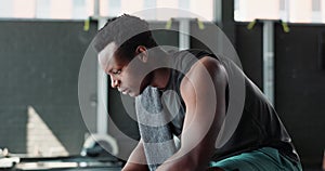 Gym, thinking and black man with fitness, face and exercise with challenge and endurance with workout. Portrait