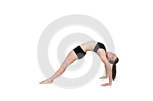 Gymnast bending over backwards arching her back