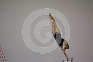 Gymnast Girl Bars One Hand