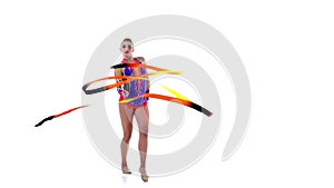 Gymnast gracefully move with a ribbon in his hands. White background. Slow motion