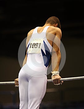 Gymnast on high bars