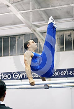 Gymnast on parallel bars