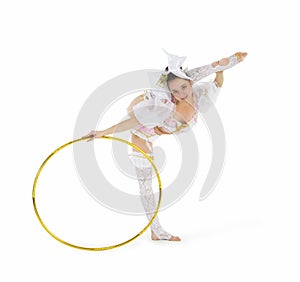 Gymnast standing twirling a hula hoop