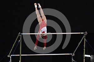 Gymnast uneven bars 01 photo