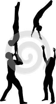 Gymnasts acrobats vector black silhouette on black background. Gymnasts acrobats vector