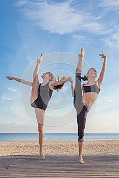 Gymnasts exercising pose