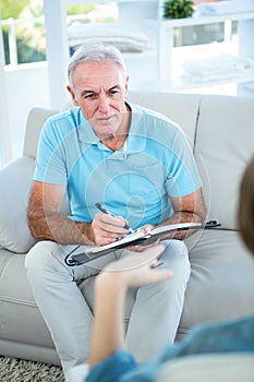 Gynaecologist talking to pregnant woman photo