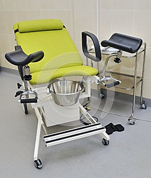 gynecological chair in the doctor\'s examination room