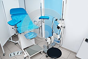 Gynecological clinic interior with chair