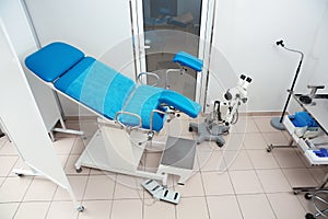 Gynecological examination chair in doctor`s office.