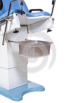 Gynecological Examination Chair Isolated on White Background. Gynaecology Table. Examination Table for Obstetrics and Gynecologist photo