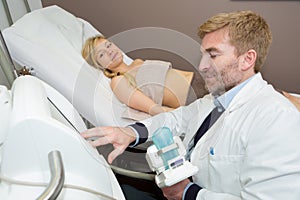 gynecologist examining a patient