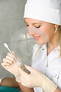 Gynecologist examining a patient photo