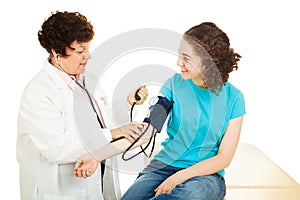 Gynecologist Taking Blood Pressure