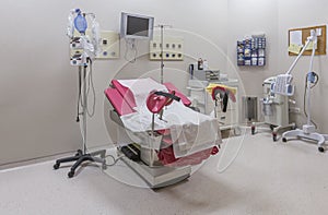 Gynecology in the clinic gynecology room, interior of the genicology clinic. Maternity chair in the surgical obstetric ward. Chair