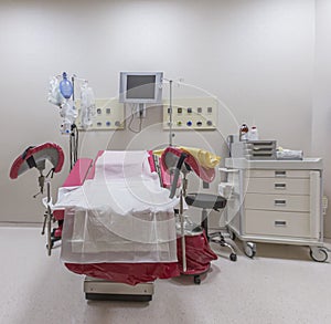 Gynecology in the clinic gynecology room, interior of the genicology clinic. Maternity chair in the surgical obstetric ward. Chair