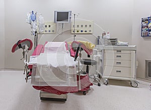 Gynecology in the clinic gynecology room, interior of the genicology clinic. Maternity chair in the surgical obstetric ward. Chair