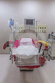 Gynecology in the clinic gynecology room, interior of the genicology clinic. Maternity chair in the surgical obstetric ward. Chair