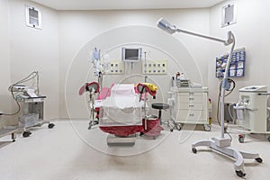 Gynecology in the clinic gynecology room, interior of the genicology clinic. Maternity chair in the surgical obstetric ward. Chair