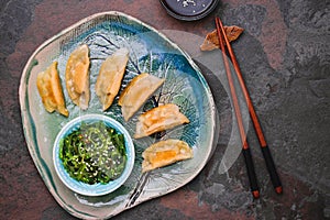 Gyoza dumplings with chuka salad