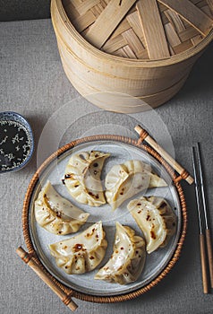 Gyoza Japanese korean dumplings on gray plate on the table. top view