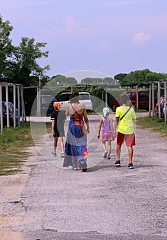 Gypsies around the parking lot looking for drive to plunder photo