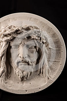 Gypsum statue of face of Christ