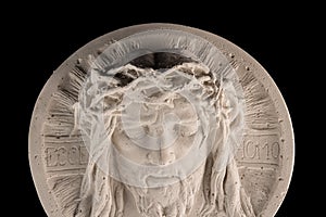 Gypsum statue of face of Christ