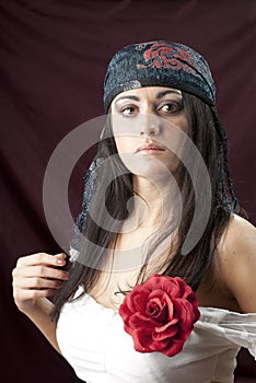 Gypsy girl. Portrait of young woman in ethnic costume.