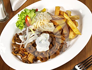 Gyros with Coleslaw and French Fries and Onions