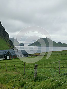 Gásadalur village in a cloudy summer day, Vagar, Faroe Islands