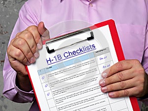 H-1B Checklists phrase on the piece of paper