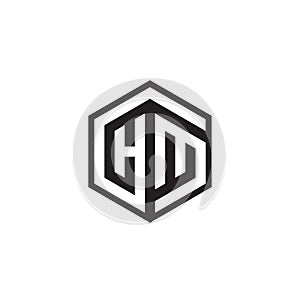 H M hexagon letter logo design concept