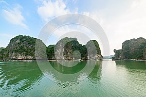 Ha Long Bay, unique limestone rock islands and karst formation peaks in the sea, famous tourism destination in Vietnam. Clear blue