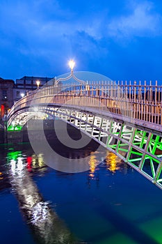 Ha'penny Bridge over Liffey river in Dublin, Ireland.