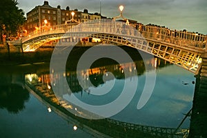 Ha'penny Bridge. River Liffey in Dublin.