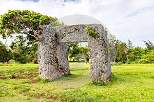 Haamonga a Maui or Burden of Maui, stone trilithon in Tonga, overgrown in jungle, Tongatapu island, Polynesia, Oceania.