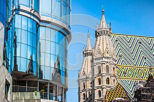 Haas Haus with St. Stephen's Cathedral at Stephansplatz in Vienna, Austria photo