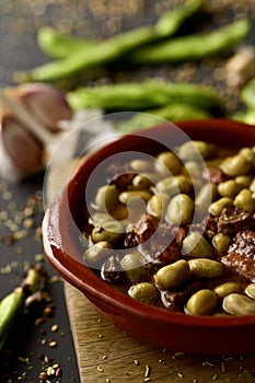 Habas a la catalana, a spanish recipe of broad beans photo