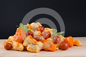 Habenero cheese curds with peppers, tomatoes, and oregano