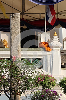 The habit of a monk was put on a balustrade in the courtyard of Wat Na Phra Men in Ayutthaya (Thailand)