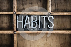 Habits Concept Metal Letterpress Word in Drawer photo
