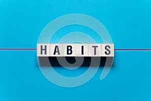 Habits word concept on cubes