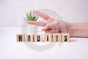 HABITS word made with building blocks, habits concept.