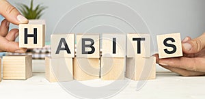 HABITS word written on building blocks