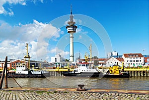 The habour of Bremerhaven with ships an the famous Radarturm in the background