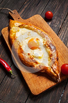 Hachapuri on Adjara. Beautiful open pies khachapuri with egg